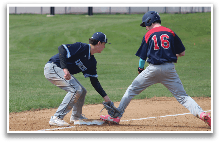 Two baseball players are on a field, one trying to slide into a base while the other is attempting to catch the ball. AI generated content