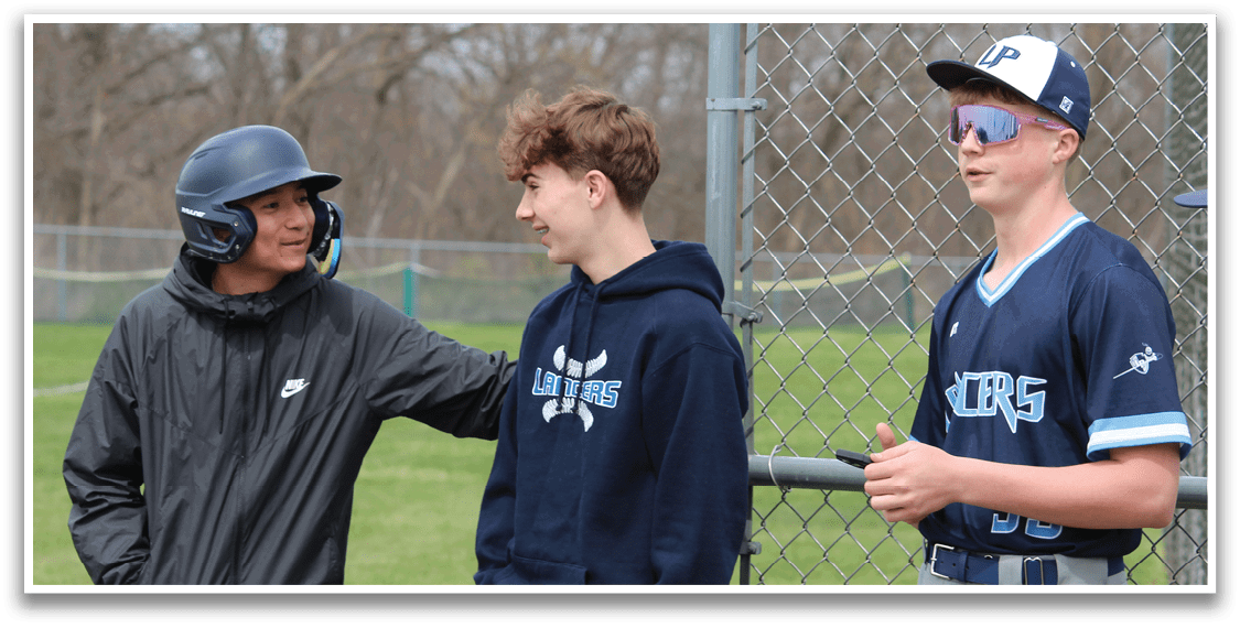 A group of young men wearing baseball uniforms are standing on a field. AI generated content