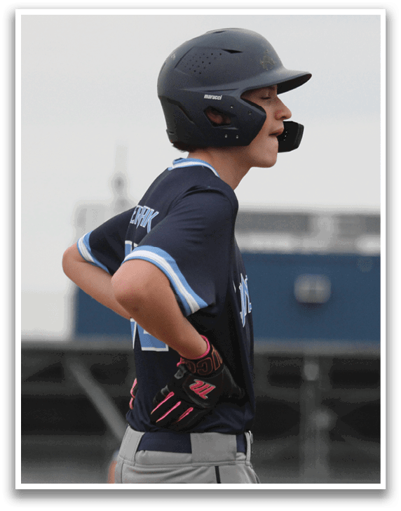 A boy wearing a baseball helmet and holding a bat. AI generated content