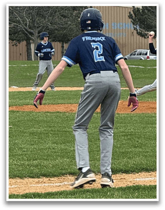 A baseball game is taking place on a field with a batter, catcher, and umpire. The batter is swinging a bat, and the catcher is wearing a baseball glove. AI generated content