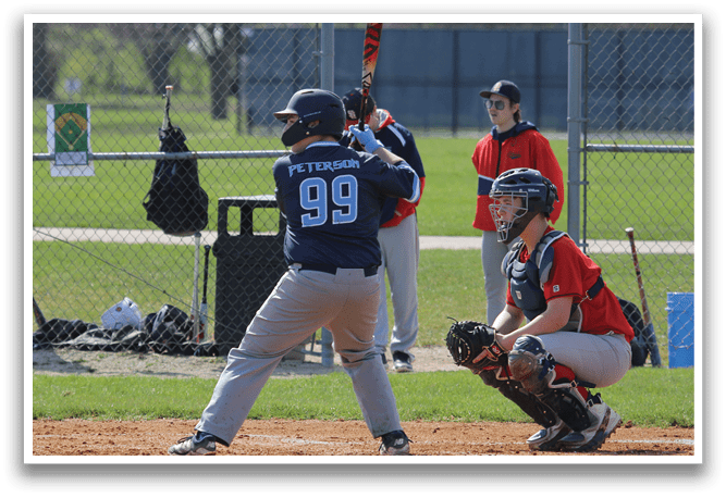 A baseball player is at bat, holding a bat and getting ready to swing. The catcher and umpire are also present, waiting for the pitch. AI generated content