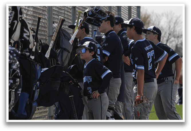 Baseball players standing in a line, wearing blue uniforms and holding bats. AI generated content