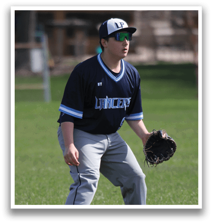A baseball player in a blue and white uniform is holding a catcher's mitt and standing on a grassy field. AI generated content
