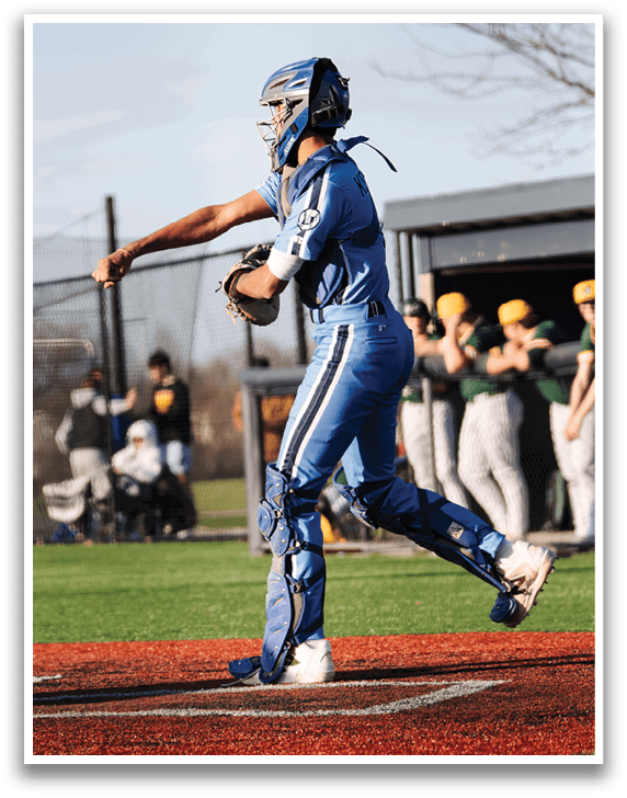 A baseball player in a blue uniform is standing on the field, holding a bat and getting ready to swing. AI generated content