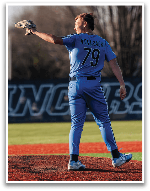 A baseball player in a blue uniform is standing on the pitcher's mound, holding his glove up. AI generated content
