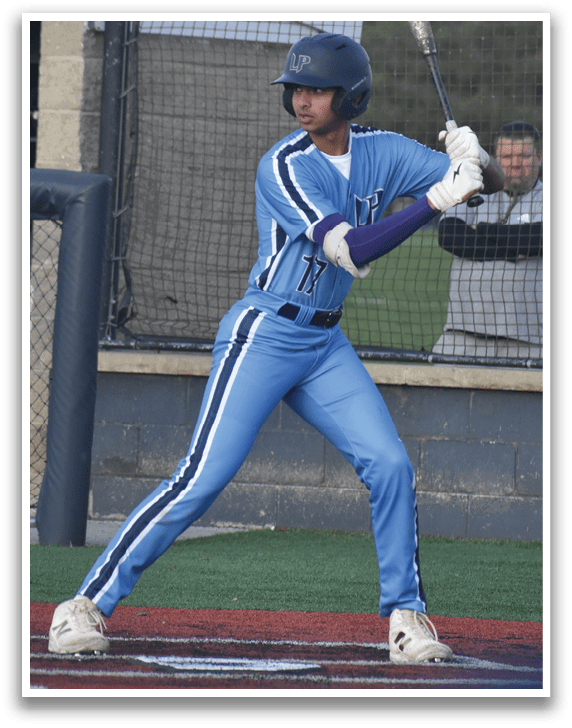 A baseball player in a blue uniform is swinging a bat on a field. AI generated content