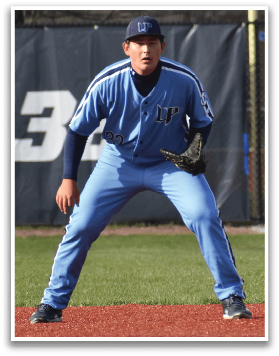 A baseball player in a blue uniform is crouching on the field, ready to catch a ball. AI generated content