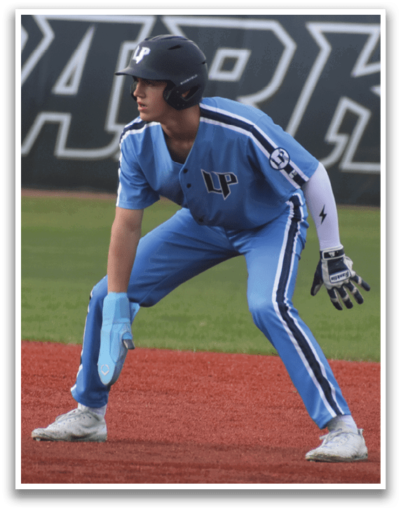 A baseball player in a blue uniform is standing on the field, holding a bat and preparing to swing. AI generated content