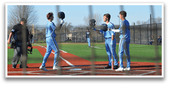 Three baseball players wearing blue uniforms are standing on a field. AI generated content