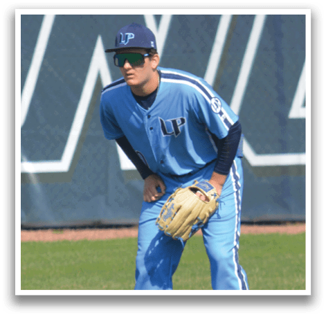 A baseball player wearing a blue uniform is standing on a field. AI generated content