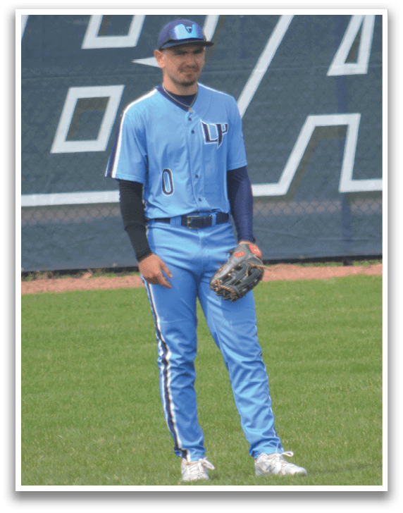 A baseball player in a blue uniform stands on a field. AI generated content