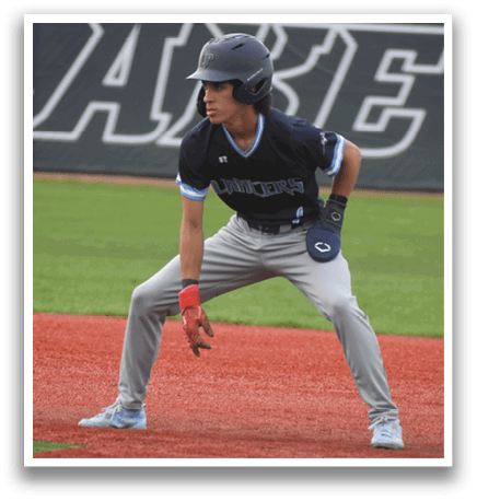 A baseball player in a blue and grey uniform is standing on the field, holding a baseball glove. AI generated content