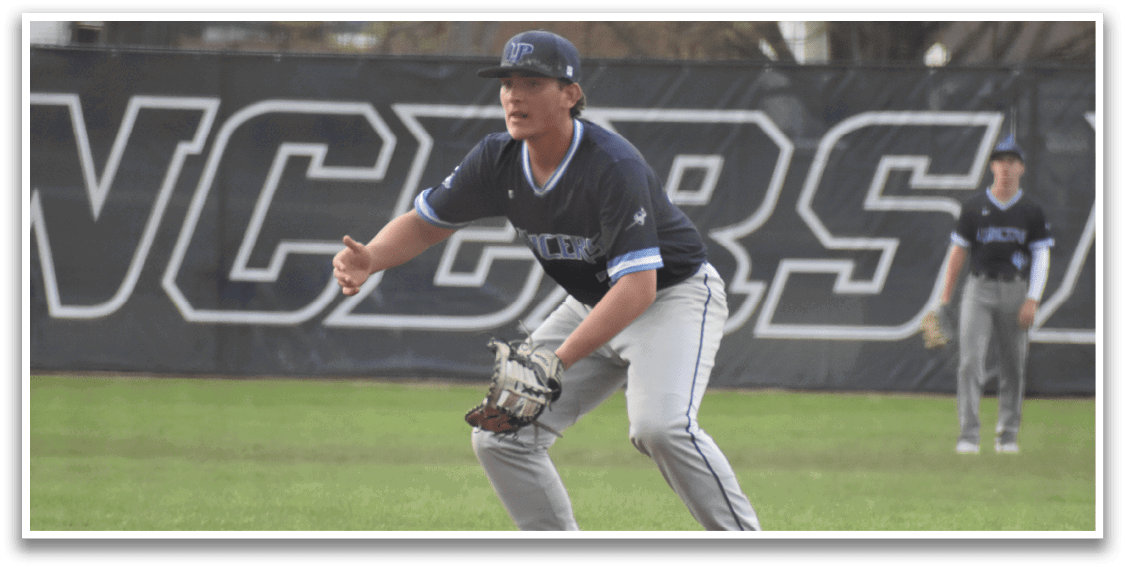 A baseball player in a blue shirt and white pants is standing on a base, holding a baseball glove. AI generated content
