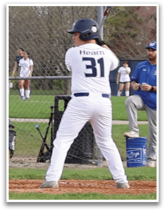 A baseball player is at bat, holding a bat and preparing to swing. The catcher and umpire are behind him, ready for the play. AI generated content