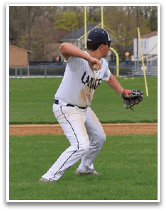 A baseball player in a white uniform is throwing a ball on a field. AI generated content