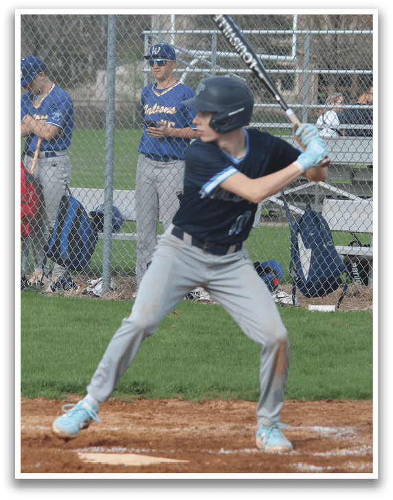 A baseball player is swinging a bat at a ball. AI generated content