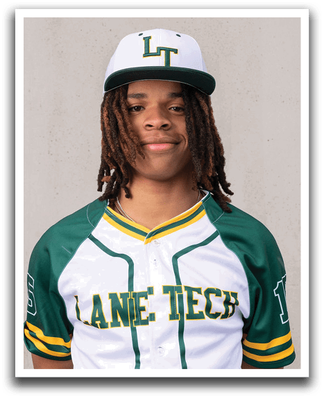 A young man wearing a green and white baseball uniform. Description generated by AI