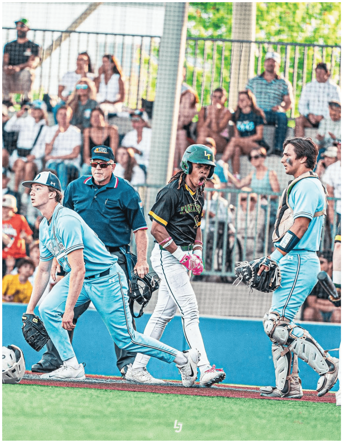 A baseball player wearing a green helmet and white pants. Description generated by AI