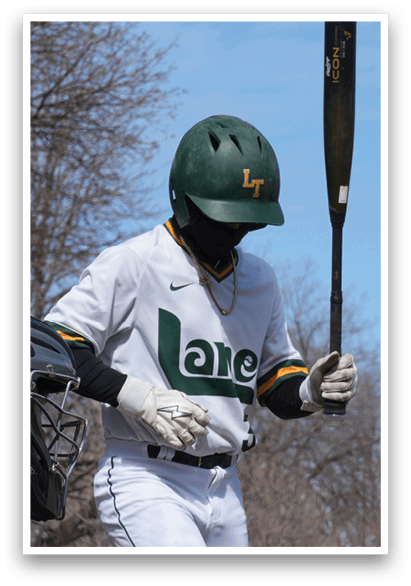 A baseball player holding a bat, wearing a green helmet and a white jersey with the letters L and A on it. AI generated content