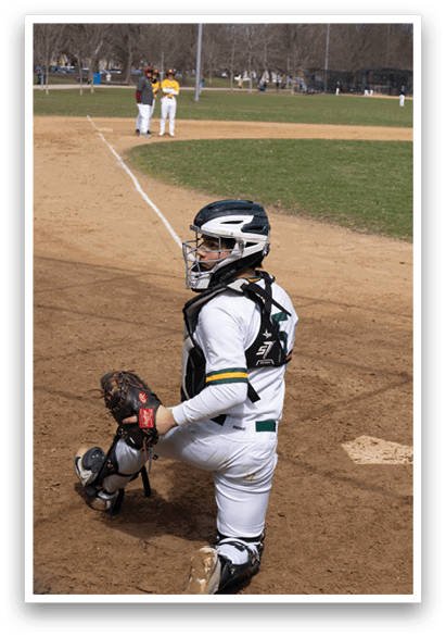 A young boy is playing baseball, wearing a catcher's mitt and standing on a base. AI generated content