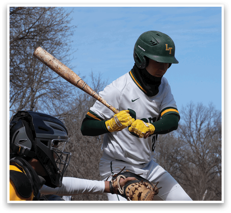 A baseball player is holding a bat and getting ready to hit the ball. AI generated content