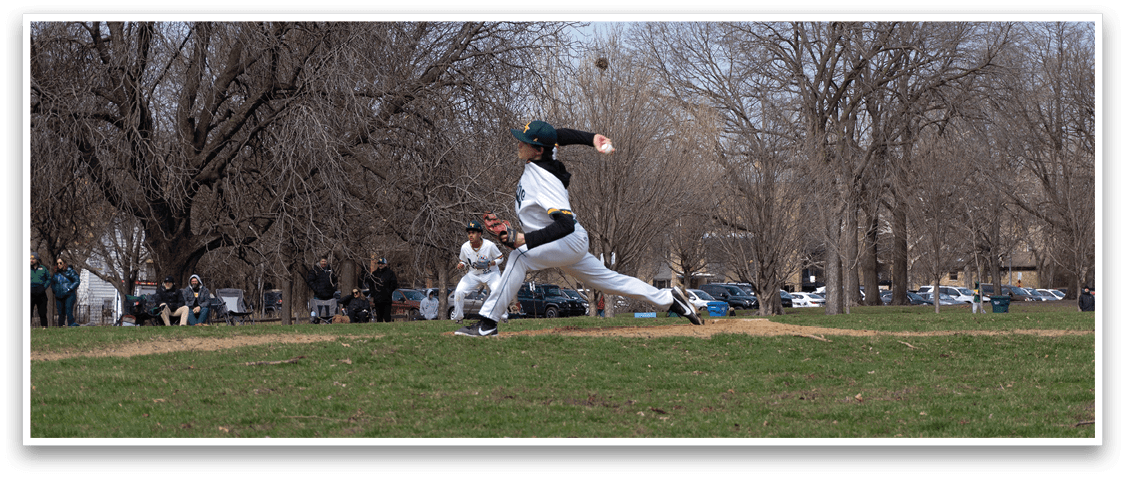 A baseball player in a white uniform is pitching a ball on a field. AI generated content