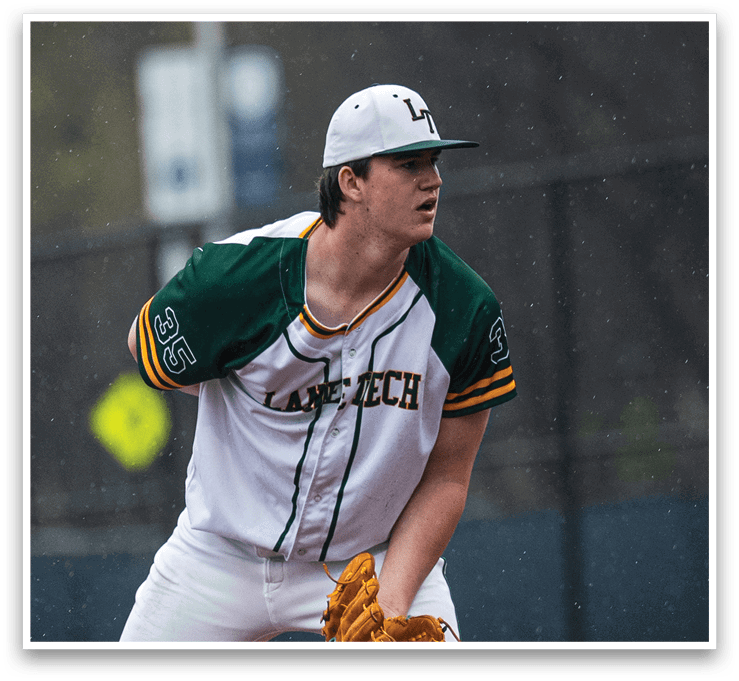 A baseball player wearing a white uniform and a green and yellow shirt is standing on the pitcher's mound, holding a baseball glove. AI generated content