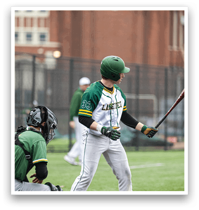 A baseball player in a green and white uniform is holding a bat, ready to swing. AI generated content
