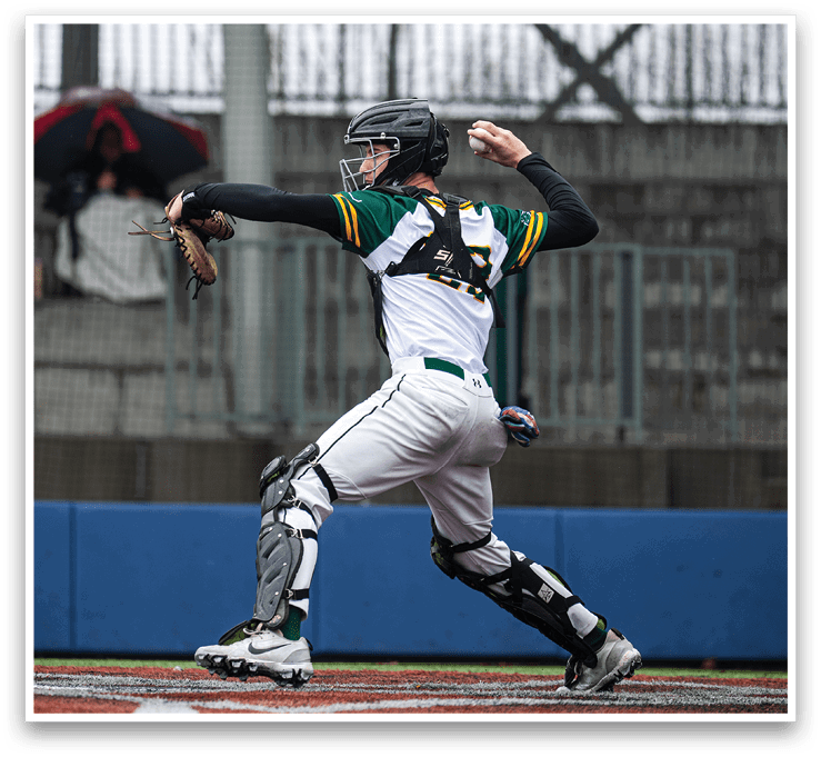 A baseball player in a white and green uniform is throwing a ball. AI generated content