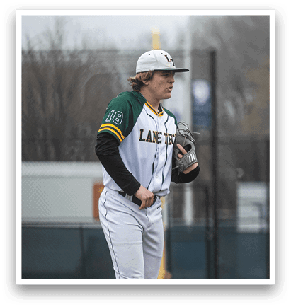 A baseball player stands on the pitcher's mound, holding a baseball glove. AI generated content