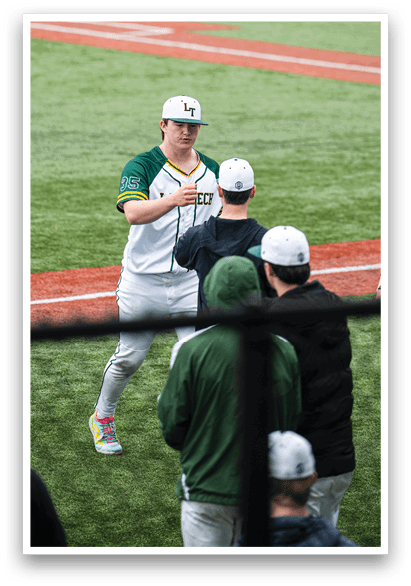Baseball players on the field, one of them wearing a green and white uniform. AI generated content