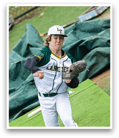 A baseball player in a green and white uniform is pitching a ball on a field. AI generated content