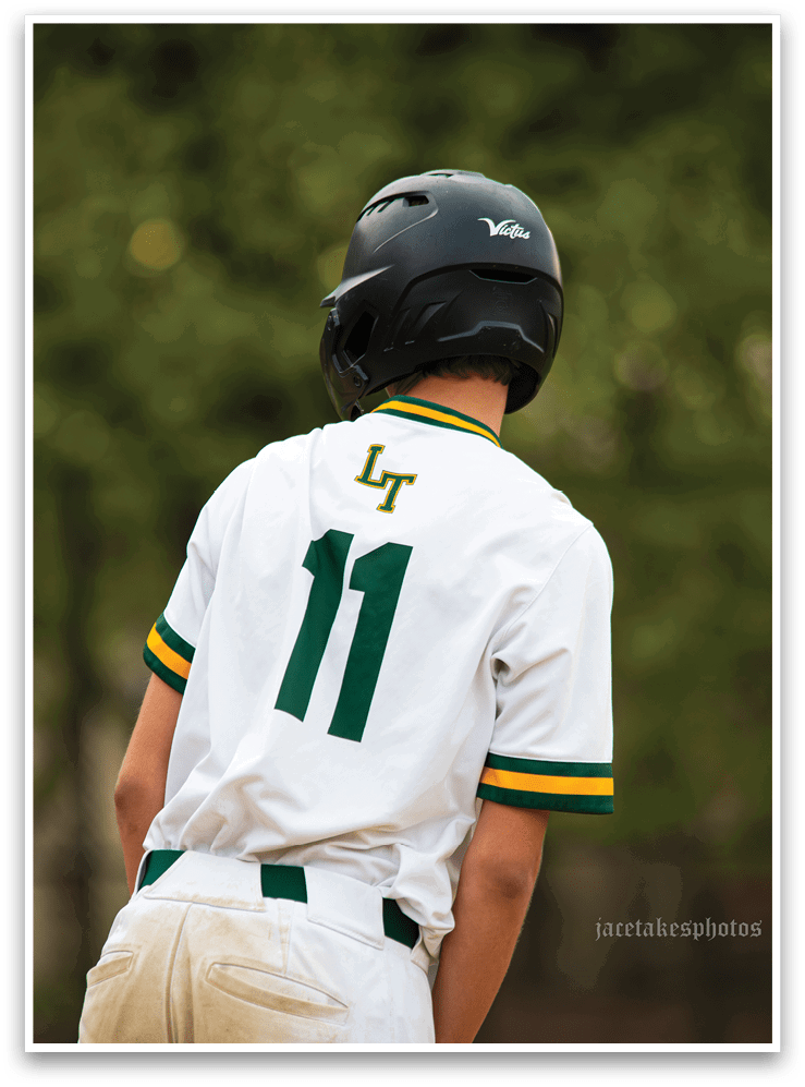 A baseball player in a white uniform is running towards home plate. AI generated content