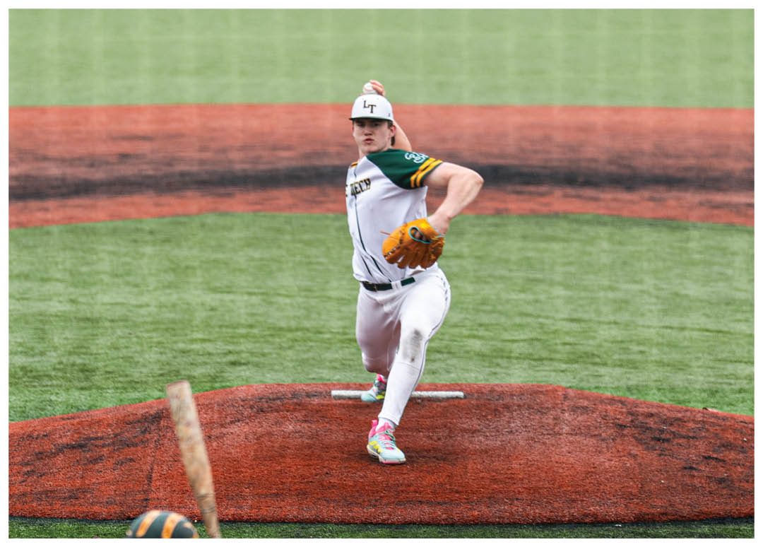 A baseball player is pitching a ball. Description generated by AI
