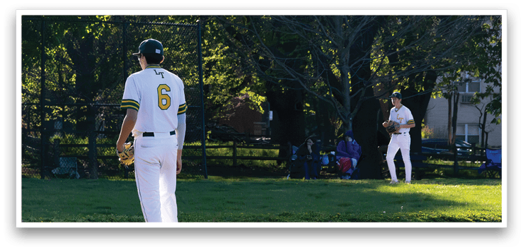 A baseball player wearing a white uniform with the number 6 on the back. Description generated by AI