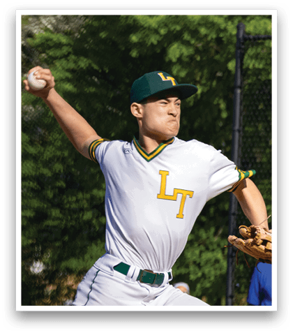 A baseball player in a white and green uniform is throwing a baseball. Description generated by AI