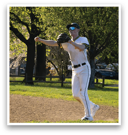 A man wearing a baseball glove and a white shirt. Description generated by AI