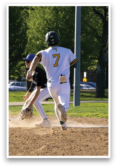 Two men playing baseball. Description generated by AI