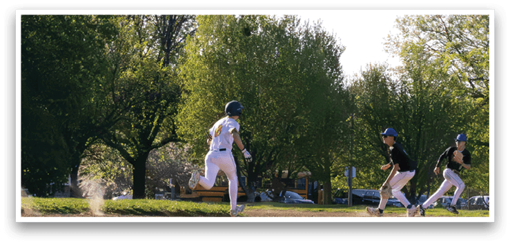 A baseball player running on the field. Description generated by AI