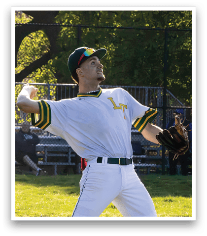 A baseball player in a white and green shirt and white pants is throwing a ball. Description generated by AI