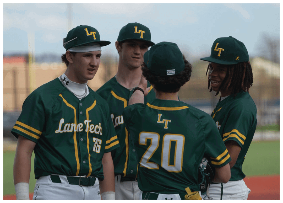 Four baseball players wearing green and yellow uniforms. Description generated by AI