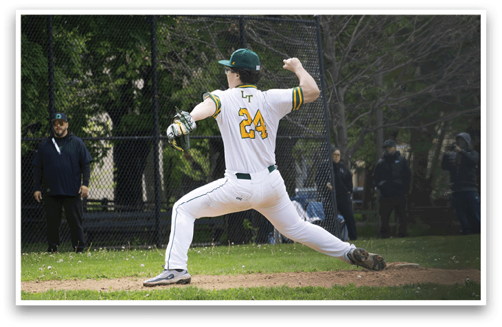 A baseball player in a white and green uniform is throwing a ball. Description generated by AI