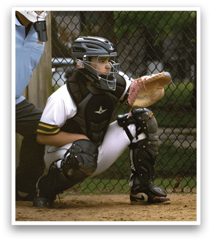 A baseball player is holding a bat. Description generated by AI