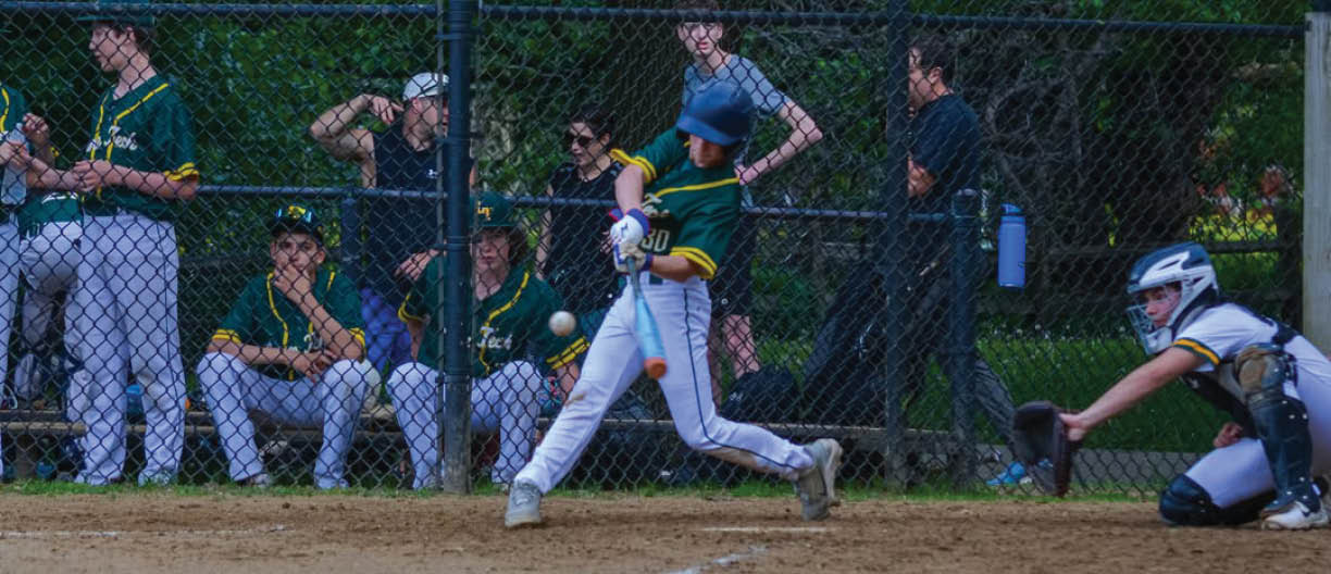 A baseball player is swinging a bat at a ball. Description generated by AI