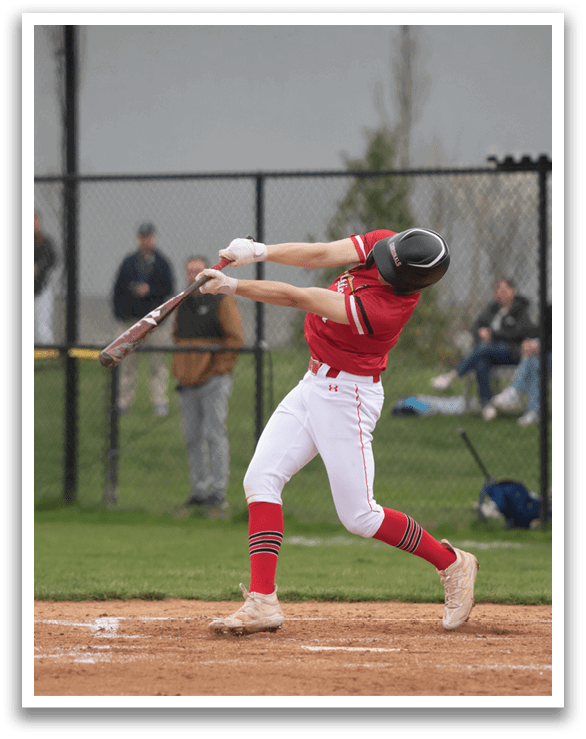 A baseball player in a red shirt and white pants is swinging a bat at a ball. AI generated content