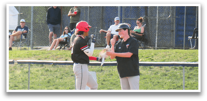 Two baseball players are talking on the field. AI generated content