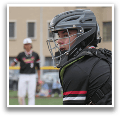 A baseball player wearing a helmet and catcher's gear is standing on a field. AI generated content