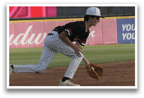 A baseball player wearing a black and red shirt and white pants is running on the field. He is holding a baseball glove in his hand. AI generated content