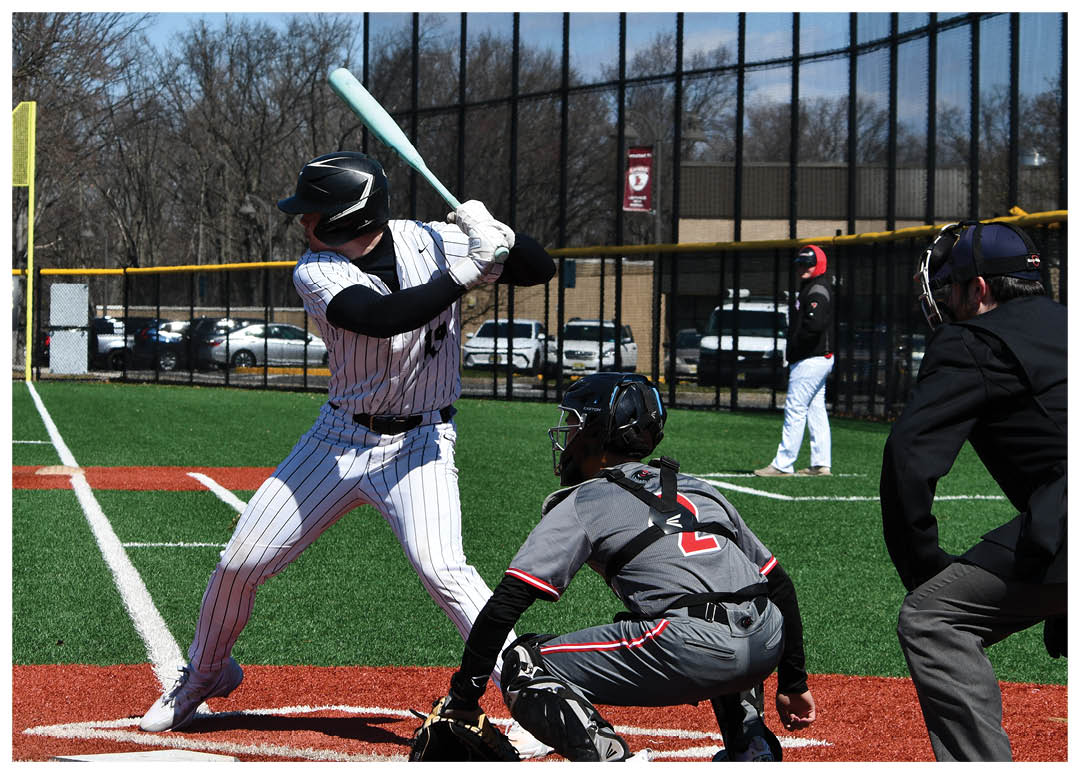 A baseball player is swinging a bat at a ball. Description generated by AI