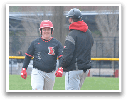 A baseball player wearing a red helmet and black shirt. Description generated by AI